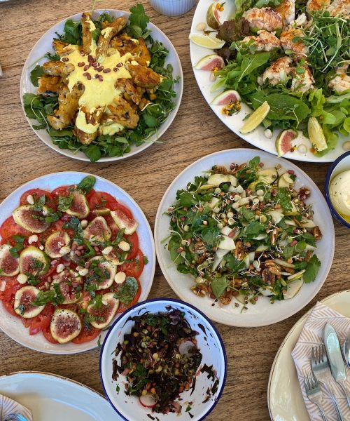 plates of food laid out on a table