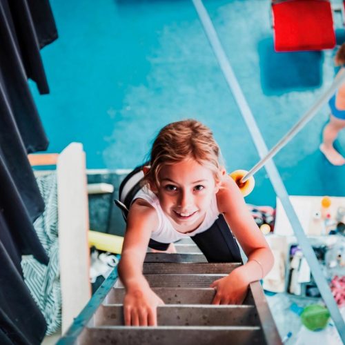 Kid enjoying climbing at Circus Arts Byron Bay